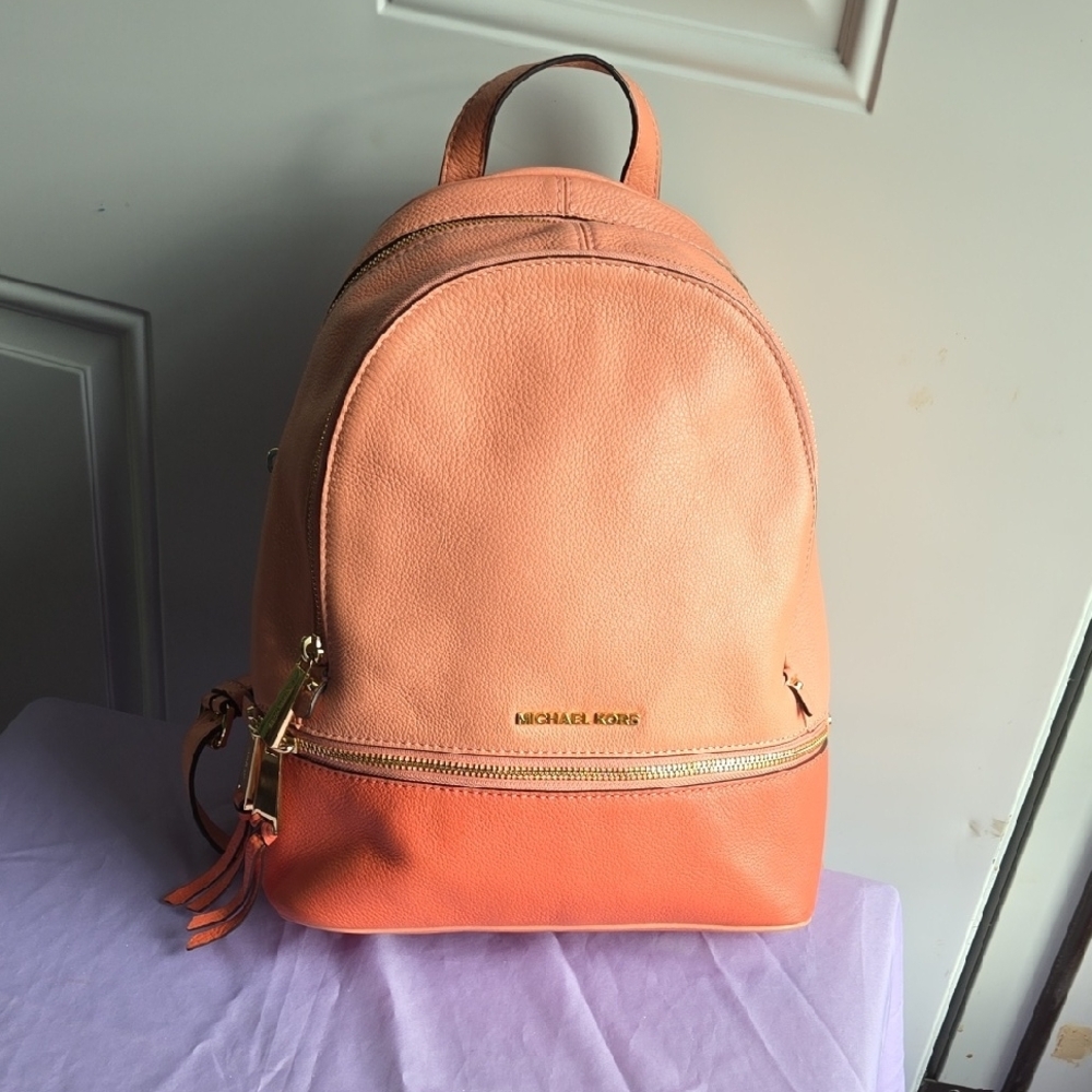 Michael Kors Pink and Orange Backpack Sleek and Stylish
